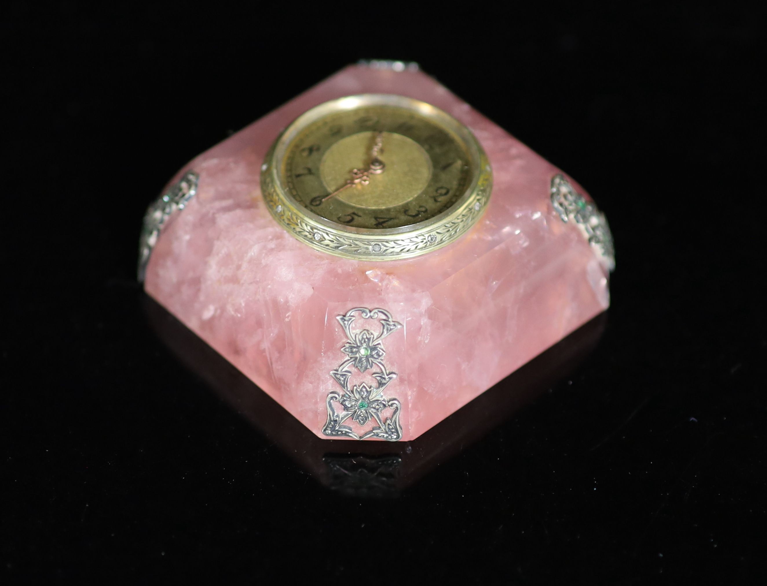 An early 20th century emerald, rose cut diamond, silver and gilt metal mounted rose quartz timepiece
